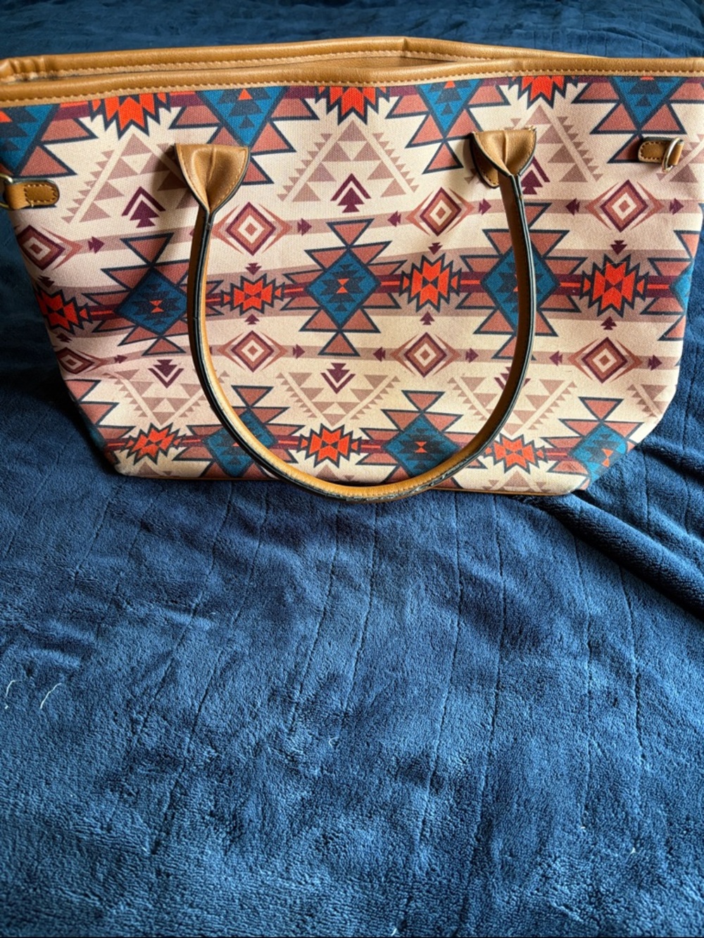 Aztec-Patterned Tote with Tan Handles and Blue Accents